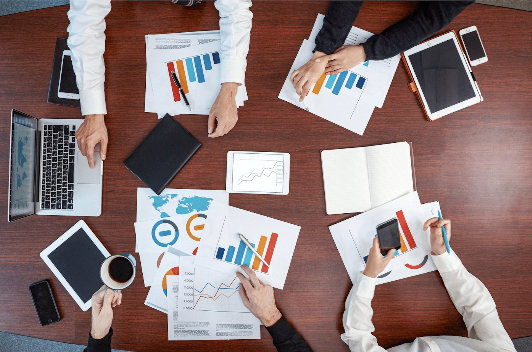 Overview of a Business Meeting with Graphs and Data Analysis